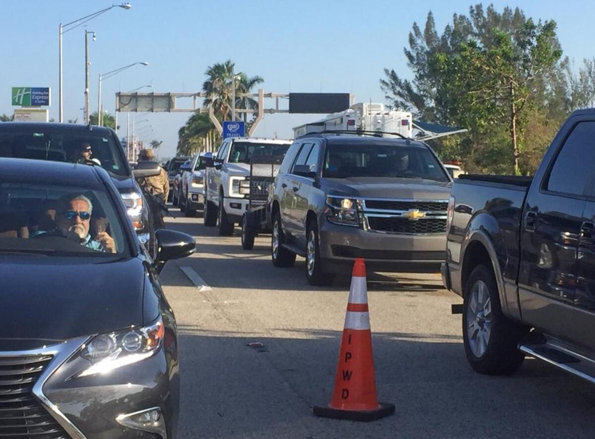 Traffic comes to a halt at the first checkpoint on U.S. 1 as Keys residents try to make their way back on home on Sunday, Sept. 17, 2017, after Hurricane Irma.